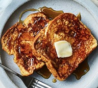 one French toast with honey and butter